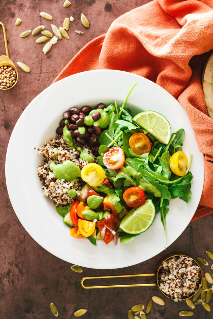 black bean quinoa bowl with green cilantro sauce